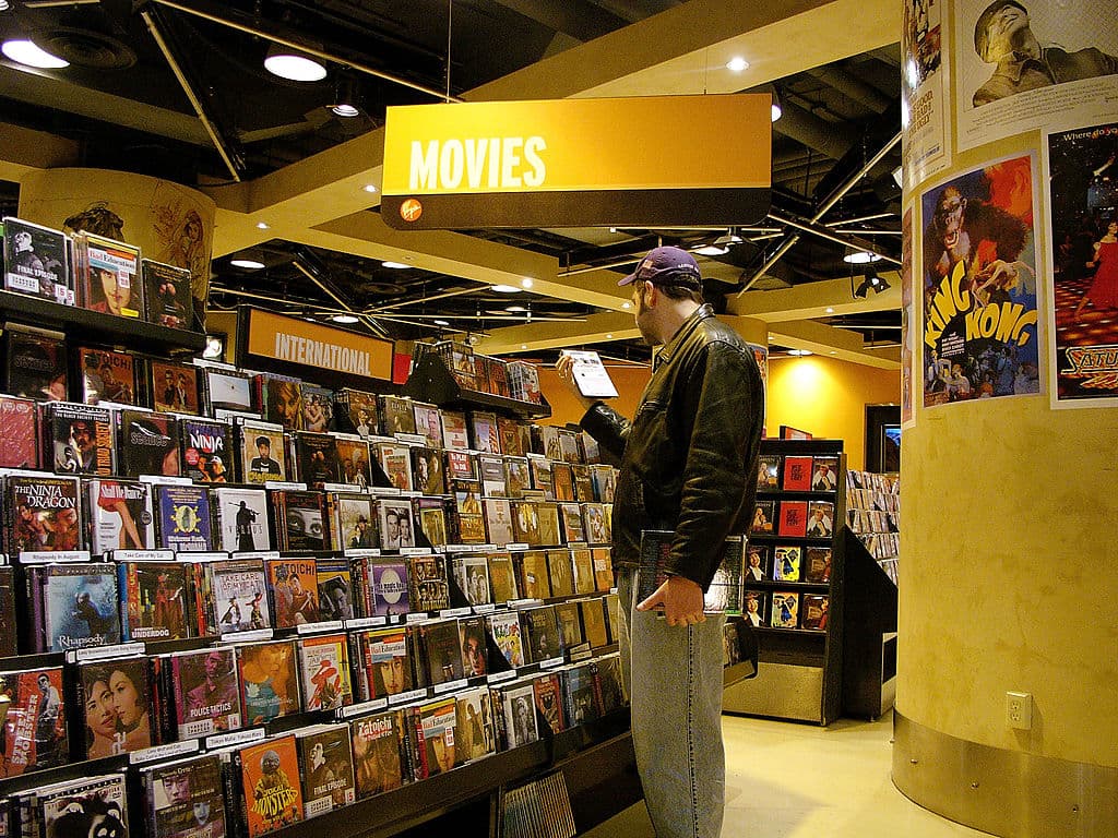NEW YORK - MAY 25: A man looks at DVD's in a store May 25, 2005 in New York City. According to a report issued this week by the Book Industry Study Group, the U.S. publishing industry continues to put out more books than the public is buying. As more people made a shift toward home video, DVD, Internet and cable, the number of books sold dropped by nearly 44 million between 2003 and 2004, even as the annual number of books published approaches 175,000. (Photo by Spencer Platt/Getty Images)