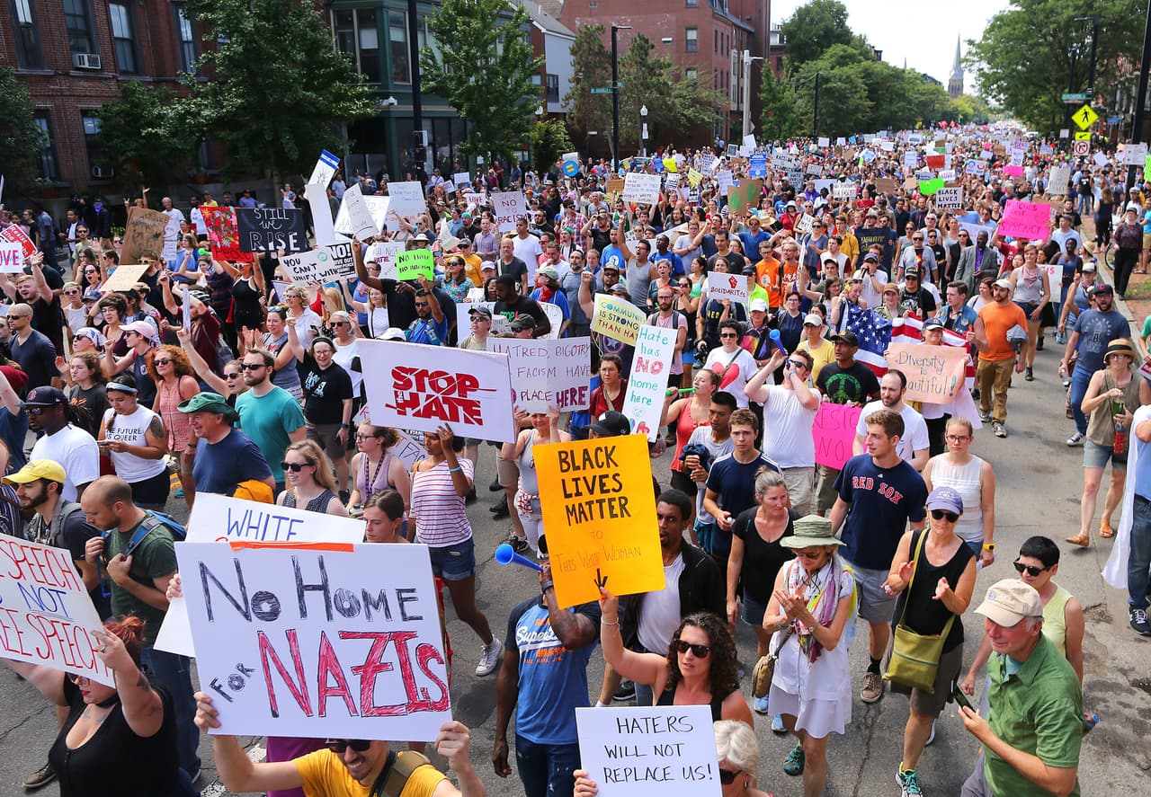 Thousands of protesters marched in Boston Saturday.