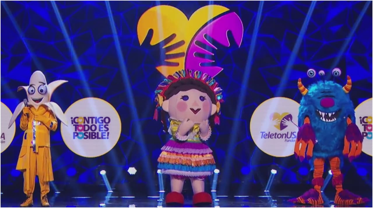 La diversión de ¿Quién Es La Máscara? llegó con una versión especial al TeletonUSA y tres personajes: Banana, la muñeca Lele y Monstruo.