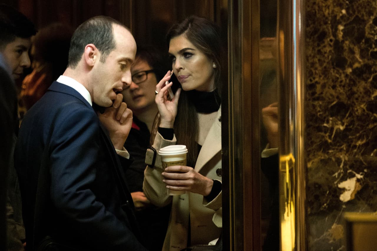 <b>The Trump Tower elevator.</b> Hope Hicks with Stephen Miller, entering the headquarters of the president-elect Donald Trump in New York. December 1, 2016.