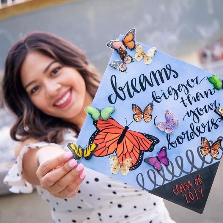 Graduation caps. This one reads: "Dreams bigger than your borders. Class of 2017."