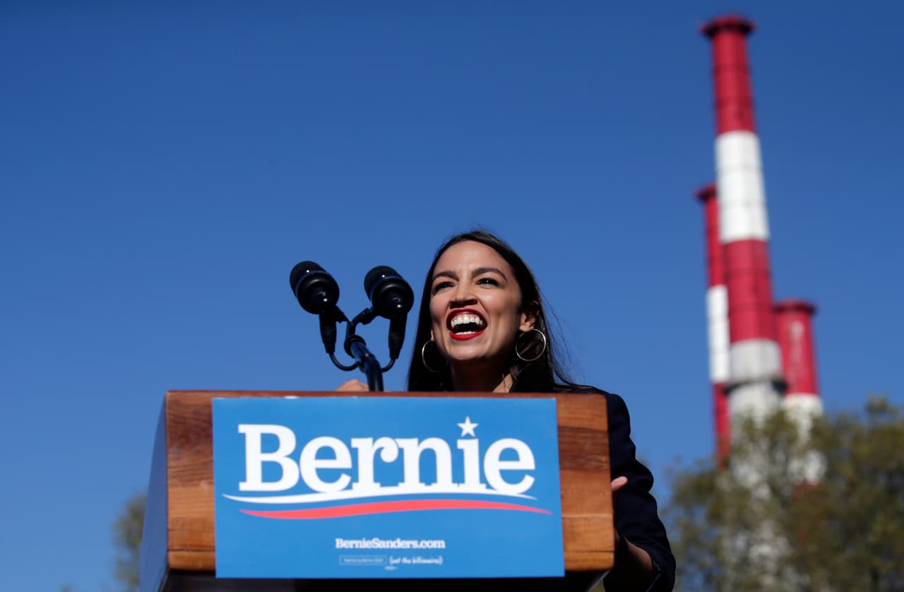 NEW YORK, NY - OCTOBER 19: Rep. Alexandria Ocasio-Cortez (D-NY) endorses Democratic presidential candidate, Sen. Bernie Sanders (I-VT) at a campaign rally in Queensbridge Park on October 19, 2019 in the Queens borough of New York City. This is Sanders' first rally since he paused his campaign for the nomination due to health problems. (Photo by Kena Betancur/Getty Images)