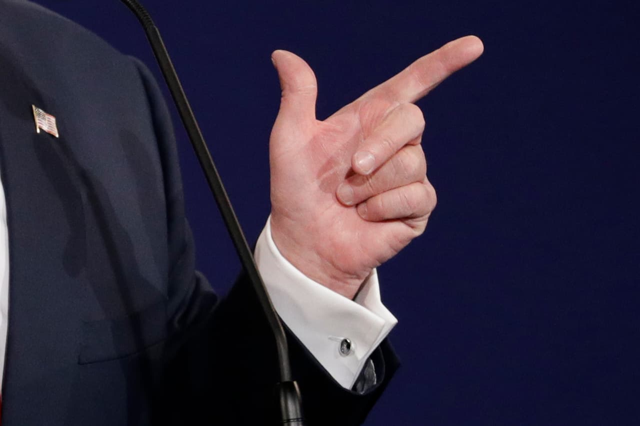 Republican presidential nominee Donald Trump answers a question during the third presidential debate at UNLV in Las Vegas, Wednesday, Oct. 19, 2016. (AP Photo/John Locher)