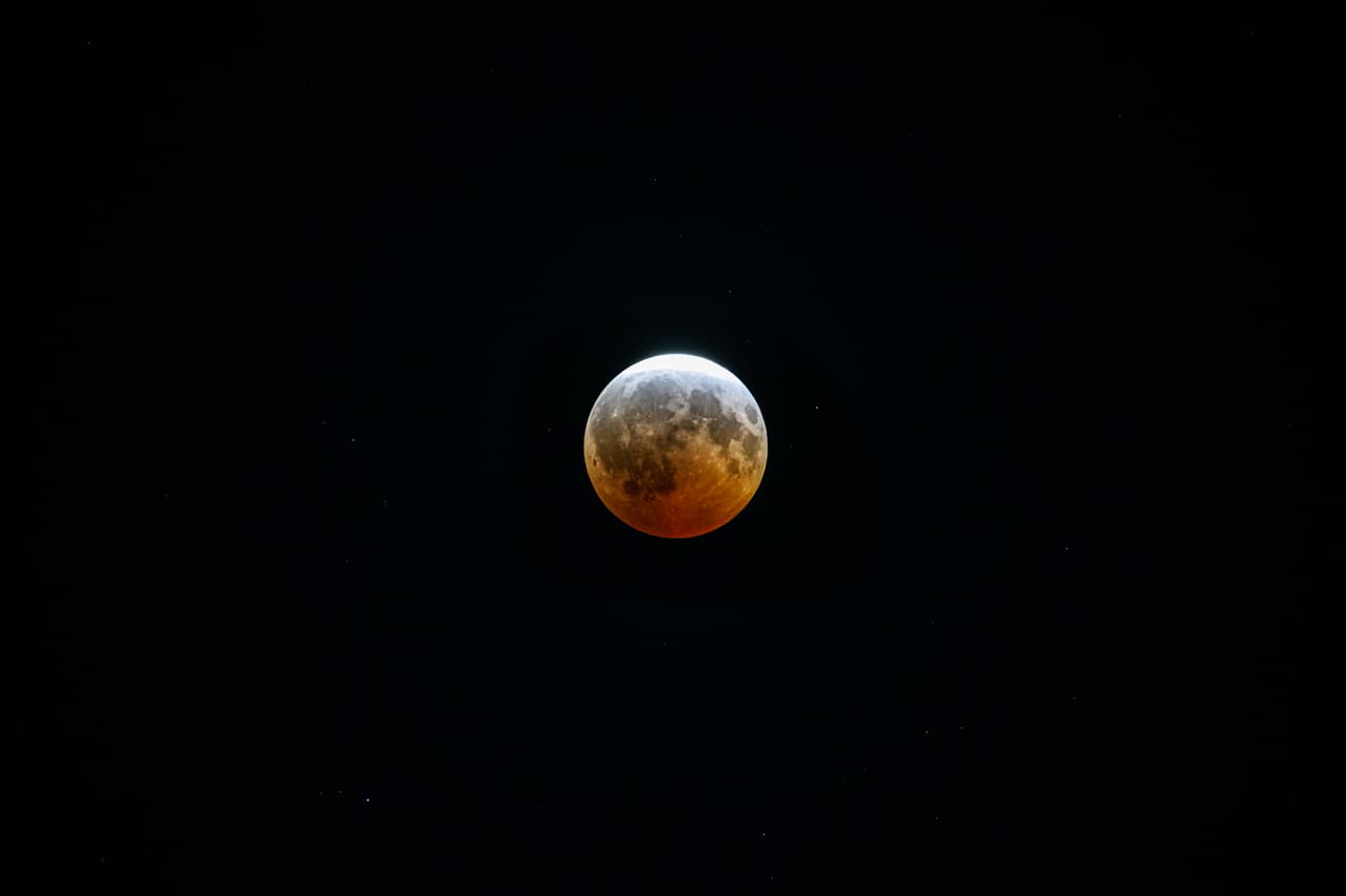 A partial lunar eclipse is seen on Thursday, Aug. 27, 2026, in Louisville, Ky. (AP Photo/Jon Cherry)