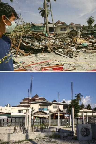 Un rescatista tailandés se asoma a la destrucción de los hoteles y tiendas de 28 de diciembre 2004 en Phi Phi Village, actualmente las labores de construcción continúan.