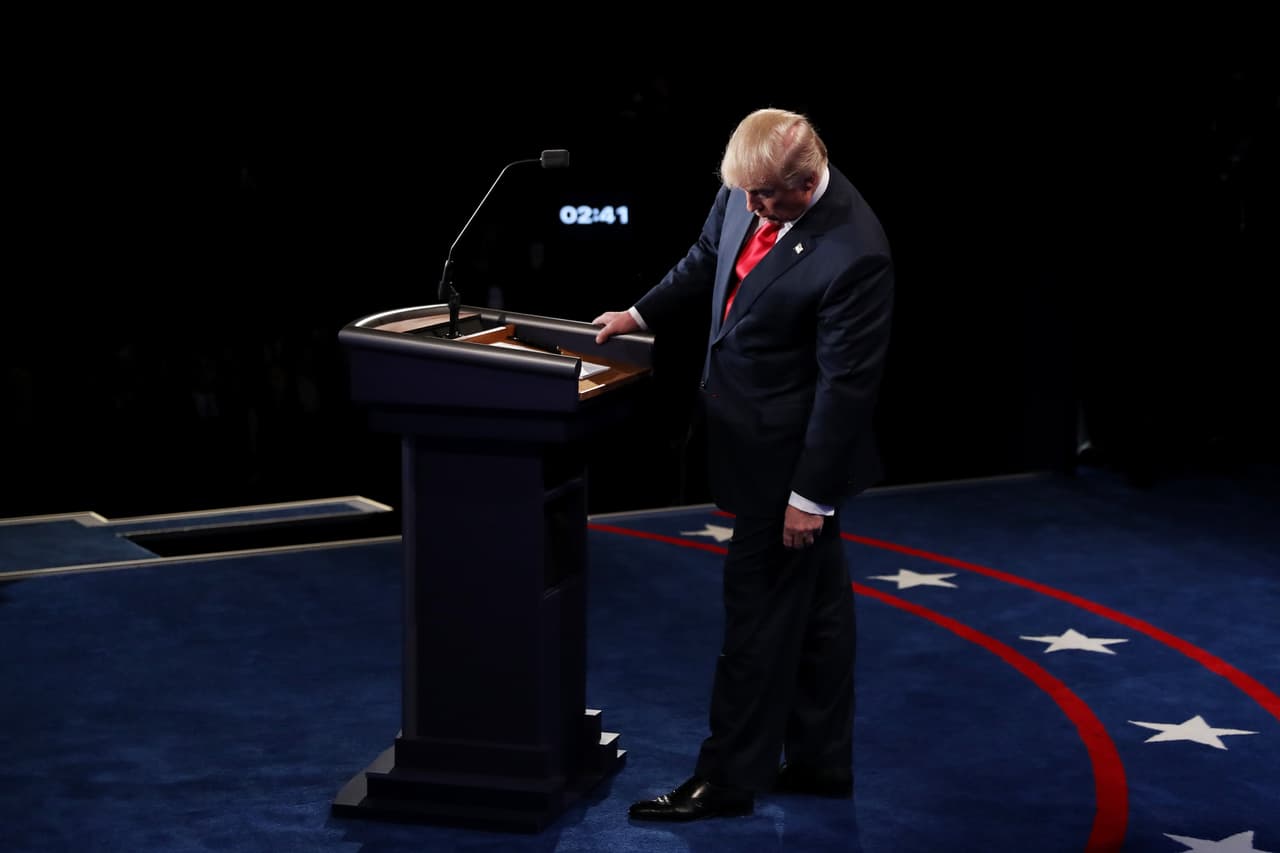 LAS VEGAS, NV - OCTOBER 19: Republican presidential nominee Donald Trump looks down at the podium during the third U.S. presidential debate at the Thomas & Mack Center on October 19, 2016 in Las Vegas, Nevada. Tonight is the final debate ahead of Election Day on November 8. (Photo by Joe Raedle/Getty Images)
