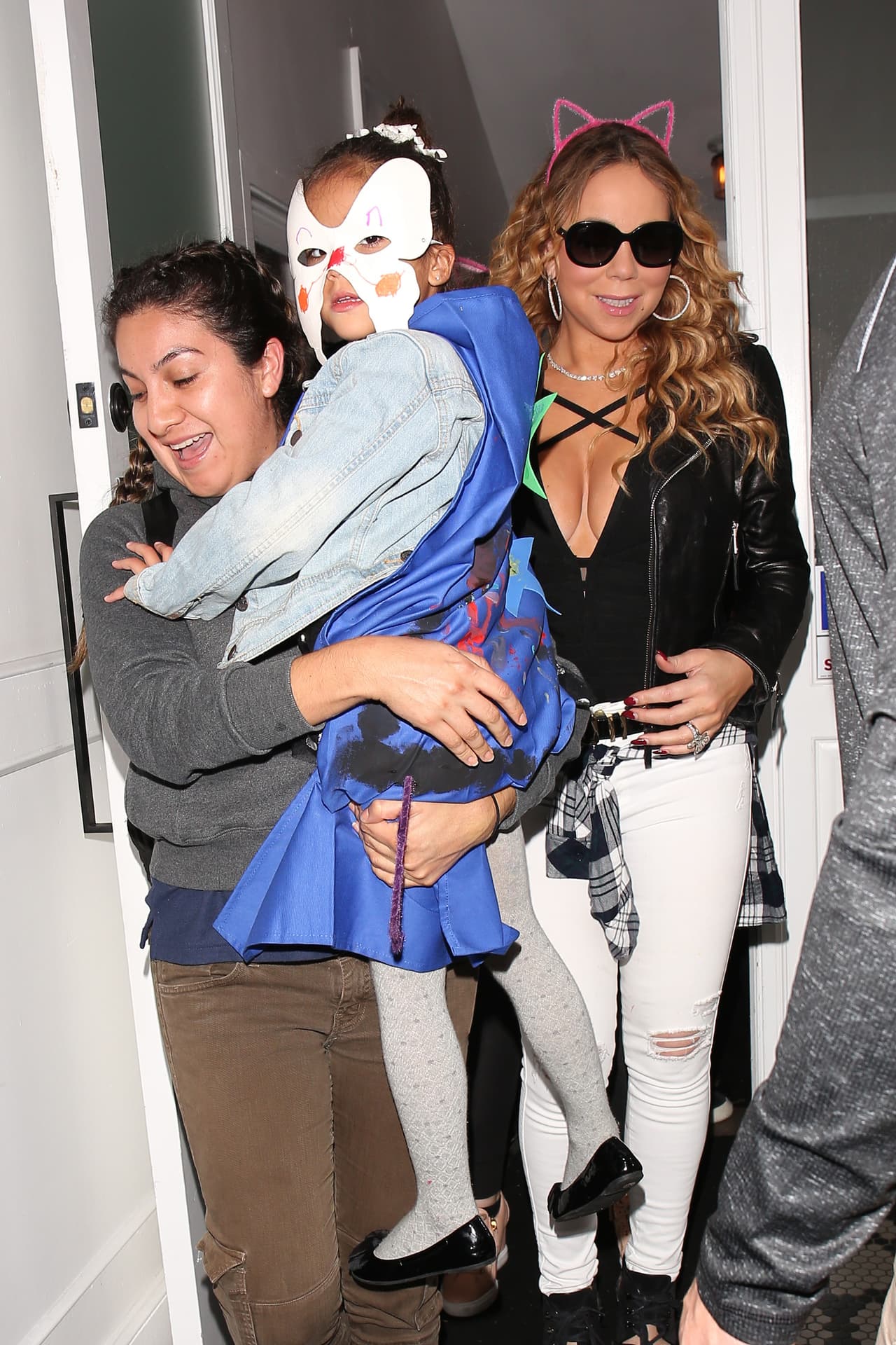 Photo © 2016 AKM GSI/The Grosby Group West Hollywood, October 30 2016 Singer, Mariah Carey, out with her twins, Monroe and Moroccan, to eat at Au Fudge in WeHo. Mariah Carey wore pink kitty ears, black moto jacket, black plunging bodysuit, white jeans, and black shoes.