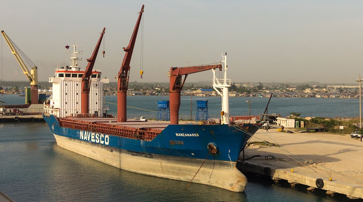 The Manzanares seen here at Terminal Varreux in Port-au-Prince on April 30 2015, while it was still being searched for drugs by the DEA and U.S. Coast Guard. "I was onboard another vessel at the time, docked just across from them. I recall a frenzy late on the afternoon that we arrived, with gunfire and someone being driven away in the back of a pickup," said Tony Sales, who took the photograph.
<br>
<br> 
<br>
