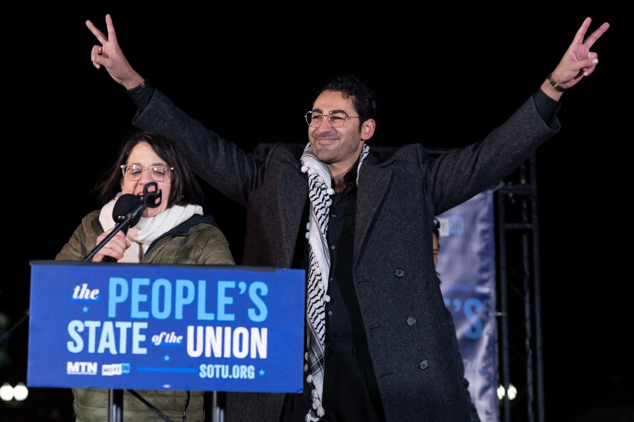 Rep. Becca Balint, D-Vt., accompanied by Palestinian born student activist Mohsen Mahdawi speaks during the "People's State of the Union" rally outside of the U.S. Capitol Tuesday, Feb. 24, 2026, in Washington. (AP Photo/Jose Luis Magana)