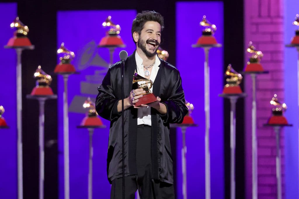 LAS VEGAS, NEVADA - NOVEMBER 18: Camilo accepts Best Urban Fusion/Performance for "Tattoo (Remix)" onstage at the Premiere Ceremony for The 22nd Annual Latin GRAMMY Awards at Michelob ULTRA Arena on November 18, 2021 in Las Vegas, Nevada. (Photo by Rich Polk/Getty Images for The Latin Recording Academy)
