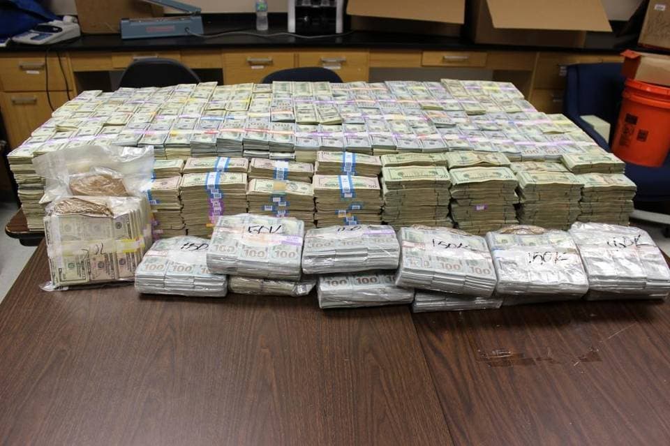 Police found so much money that they're still counting the cash.