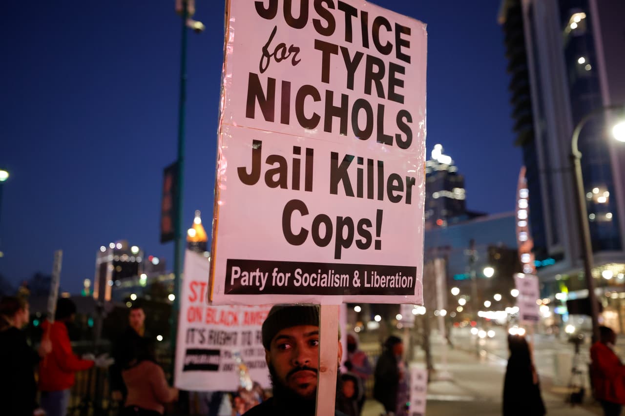 Demonstrators gather during a protest over the death of Tyre Nichols, Friday, Jan. 27, 2023, in Atlanta. (AP Photo/Alex Slitz)