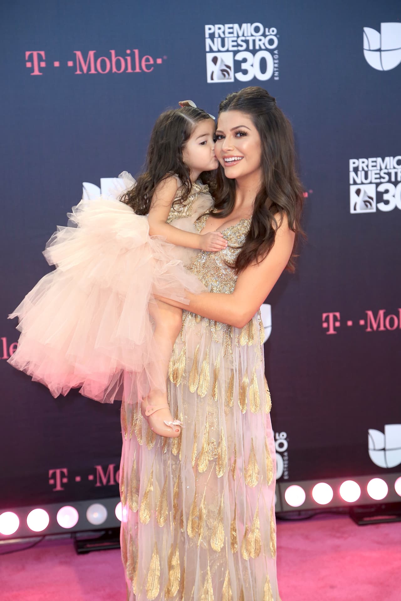 Madre e hija lucían bellas y perfectamente combinadas. Era imposible derretirse de ternura por ellas.