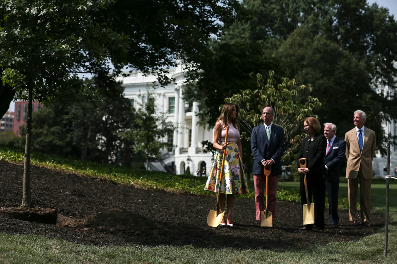 First lady Melania Trump, left, takes part in a tree planting ceremony on the south grounds of the White House August 27, 2018 in Washington, DC. The tree comes from the original Eisenhower Oak located near the Kennedy Garden that was excavated from the grounds earlier this year. Joining the first lady is Mary Jean Eisenhower, center, granddaughter of President Dwight Eisenhower and Richard Gatchell Jr., center left, fifth generation grandson of President James Monroe. (Photo by Oliver Contreras/SIPA USA)