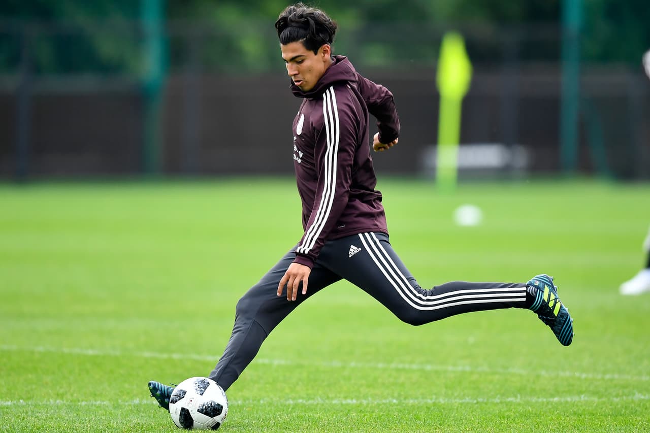 MOSCOW, RUSSIA - JUNE 12: Erick Gutierrez of Mexico takes a shot during a training session at FC Strogino Stadium on June 12, 2018 in Moscow, Russia. (Photo by Hector Vivas/Getty Images)
