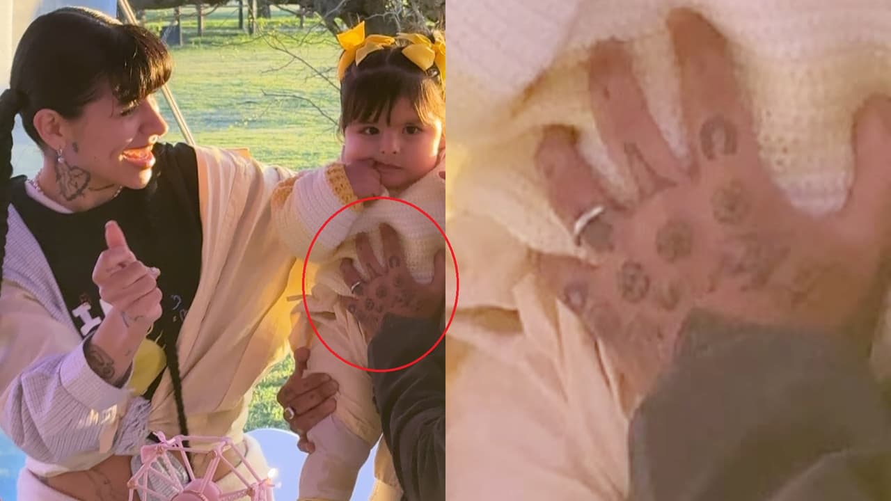 En esta imagen que Cazzu compartió en Instagram, la cantante no mostró el rostro de Nodal, pero la presencia del cantante en la fiesta fue evidente al dejarse ver que la mano con el tatuaje que sostiene a Inti era la de él.