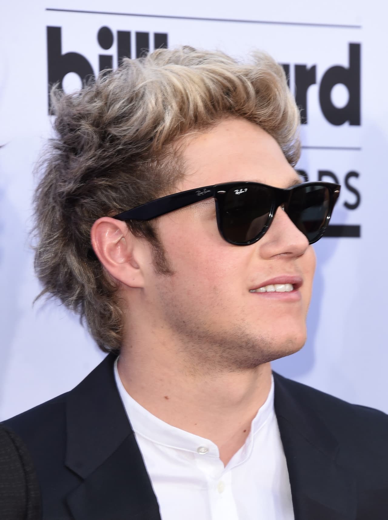 4.- Sunglasses: Para que los flashes no deslumbren, los chicos de One Direction siempre lucen los mejores estilos.