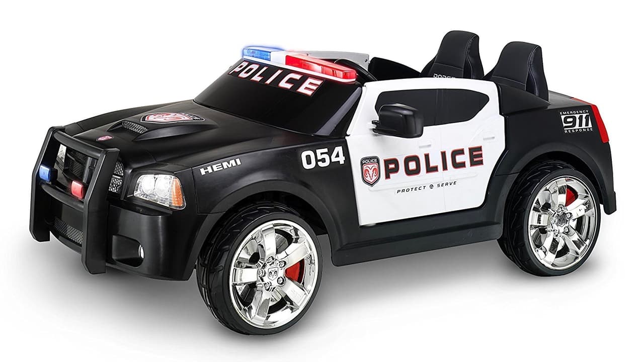 <h3 class="cms-h3-H3">Kid Trax Charger Police Car </h3>
<br>Precio:
<b> 400 dólares</b>
<br>Especificaciones:
<br>· Puertas funcionales para facilidad de ingreso y egreso.
<br>· Efectos de sonido de encendido, aceleración y comunicación con el departamento de policia.
<br>· Regulación de velocidad establecida por los padres.
<br>· Ruedas cromadas.
