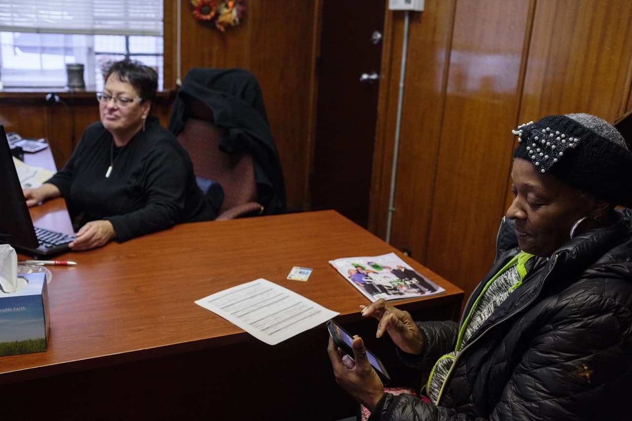 Adrianne Stokes, longtime resident of Point Breeze, inside Firstrust Bank where she was recently denied a loan, 13 Nov 2017, Philadelphia, PA. Firstrust Bank has been in the neighborhood since 1934.