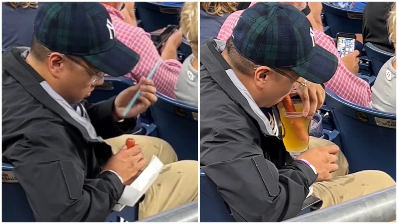 Fan de los Yankees de Nueva York usa salchicha como pitillo para beber cerveza en video viral