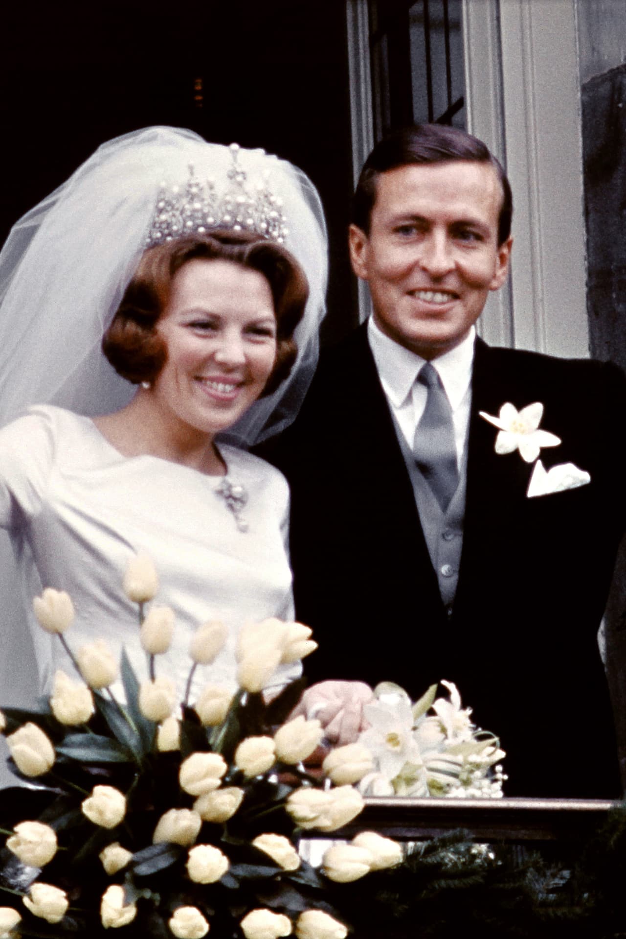 <b>1966 - Princess Beatriz of Holland and Claus von Amsberg</b>
<br>For her wedding, held 
<a href="http://www.lavanguardia.com/hemeroteca/20110310/54124349205/la-polemica-boda-de-beatriz-de-holanda-y-claus-von-amsberg.html">amidst protests</a>, the bride wore a round-necked gown by Caroline Bergé-Farwick of Maison Linette of silk and satin. The skirt and train of the gown have the design of her diadem embroidered.