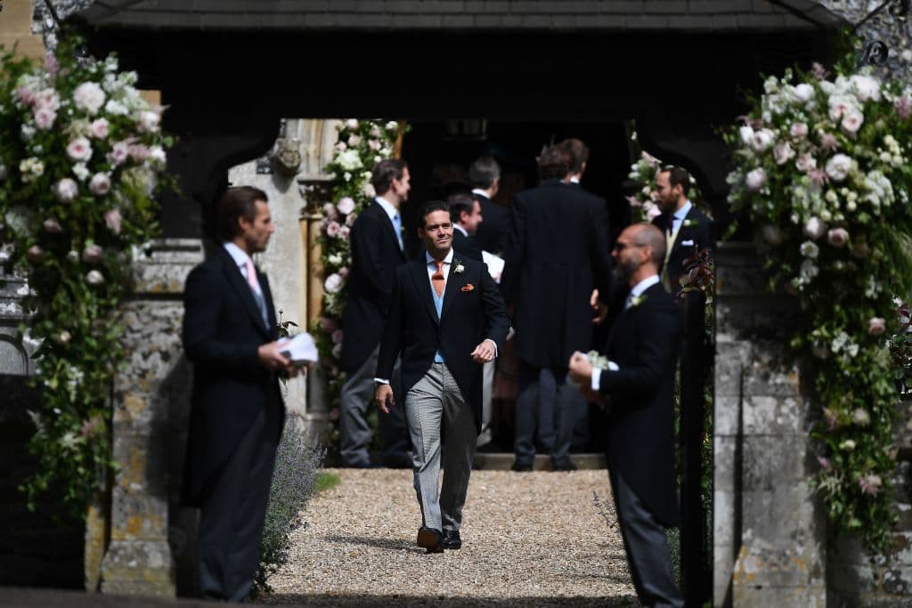 Spencer Matthews (C), brother of the groom, attends the wedding of Pippa Middleton and James Matthews at St Mark's Church in Englefield, west of London, on May 20, 2017. Pippa Middleton hit the headlines with a figure-hugging outfit at her sister Kate's wedding to Prince William but now the world-famous bridesmaid is becoming a bride herself. Once again, all eyes will be on her dress as the 33-year-old marries financier James Matthews on Saturday at a lavish society wedding where William and Kate's children will play starring roles. / AFP PHOTO / POOL / Justin TALLIS (Photo credit should read JUSTIN TALLIS/AFP/Getty Images)