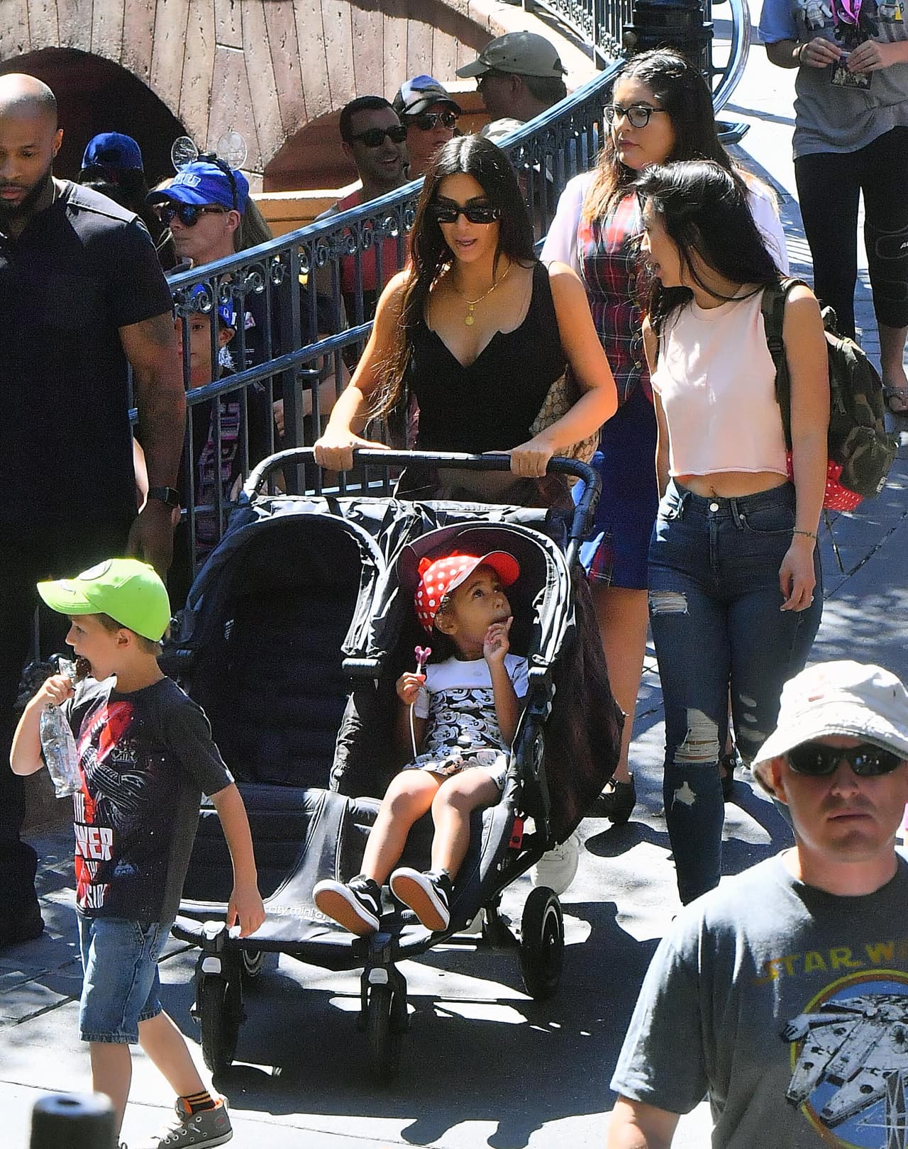 Photo © 2017 Splash News/The Grosby Group EXCLUSIVE Los Angeles, May 23, 2017. Kim Kardashian and Kanye West take their daughter and niece to the happiest place on earth, Disneyland. The group, joined by friends, were seen riding many rides including the teacups, Dumbo, Its a Small World, the gadget go coaster and many other rides on their trip. Kanye even cracked a smile on thunder mountain,