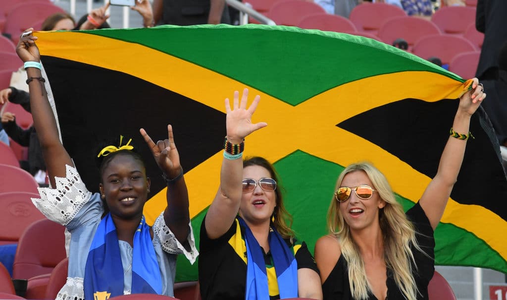 Fans of Jamaica cheer during the final football game of the 2017 CONCACAF Gold Cup against the USA at the Levi's Stadium in Santa Clara, California on July 26, 2017. / AFP PHOTO / Robyn Beck (Photo credit should read ROBYN BECK/AFP/Getty Images)