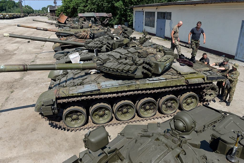 Ukrainian servicemen examine new T-72 tanks at the yard of Lviv Tank Plant in the western Ukrainian city of Lviv. The Czech Republic is reportedly sending Soviet-era T-72 tanks to help Ukrainian forces.
<br>