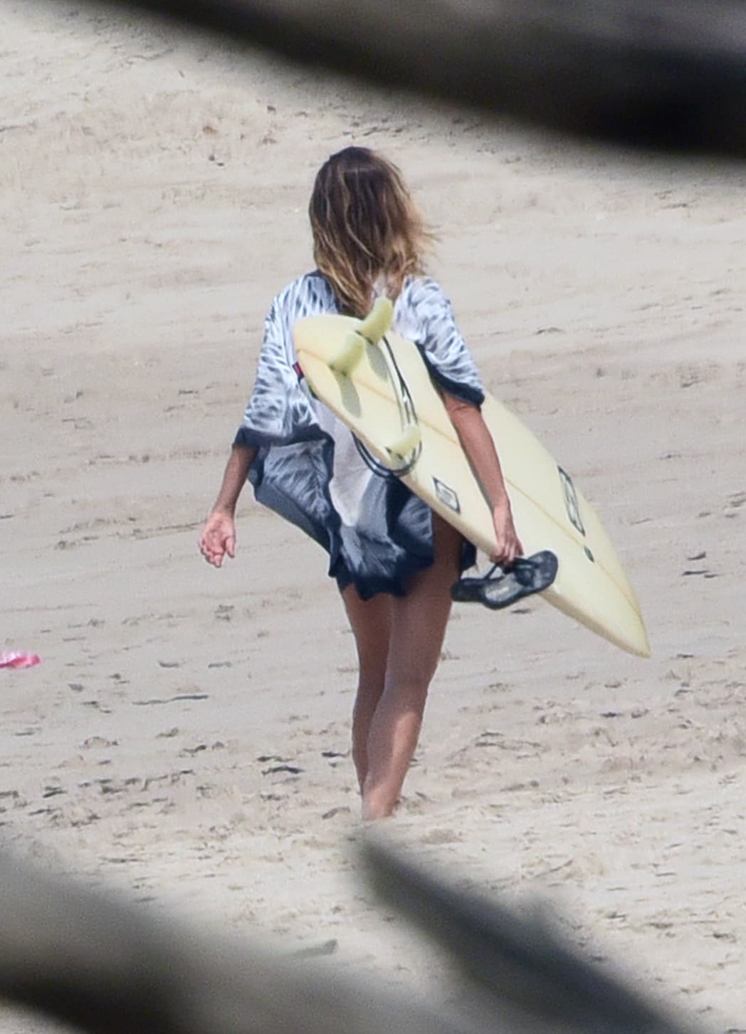 Gisele optó por hacer un poco de surf.