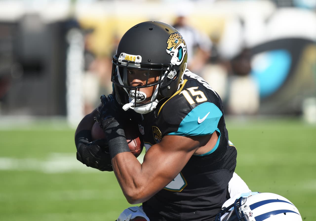 Jacksonville Jaguars wide receiver Allen Robinson (15) runs with a pass against the Tennessee Titans in a week 16 NFL football game Dec. 24, 2016 in Jacksonville, Fla. The Jaguars won 38 - 17. (Al Messerschmidt via AP)