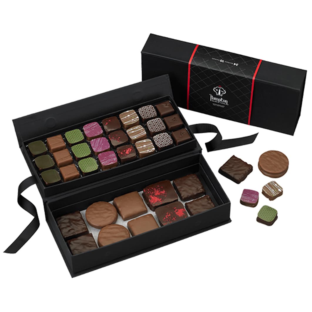 Hampton Chocolate Factory ofrece una selección de galletas, caramelos y 24 bombones artesanales revestidos de chocolate y rellenos de sabores como maracuyá, té verde y frambuesa. 24 Bonbons & 10 Treats Gift Box, $80 USD, hamptonchocolatefactory.com