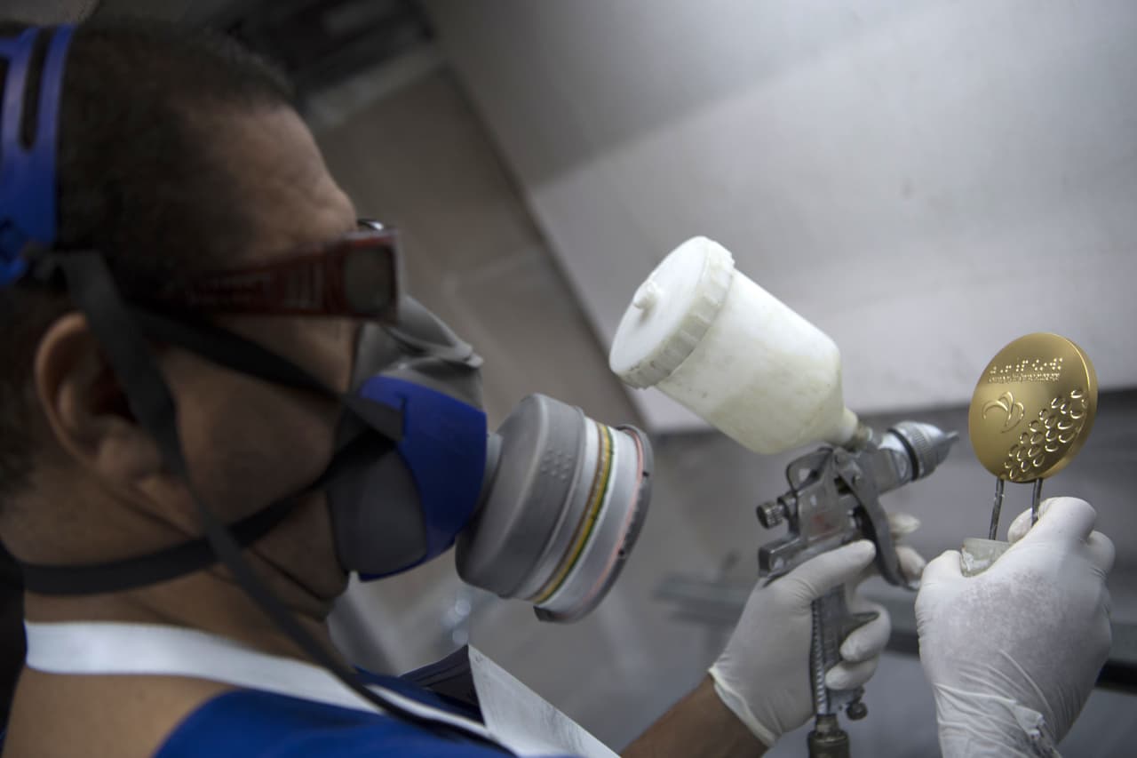 La medalla de bronce está compuesta de 97% de cobre, un 2,5% de zinc y 0,5% de estaño. Es el mismo cobre que se utiliza en la Casa de la Moneda de Brasil para producir los reales metálicos.
<br>