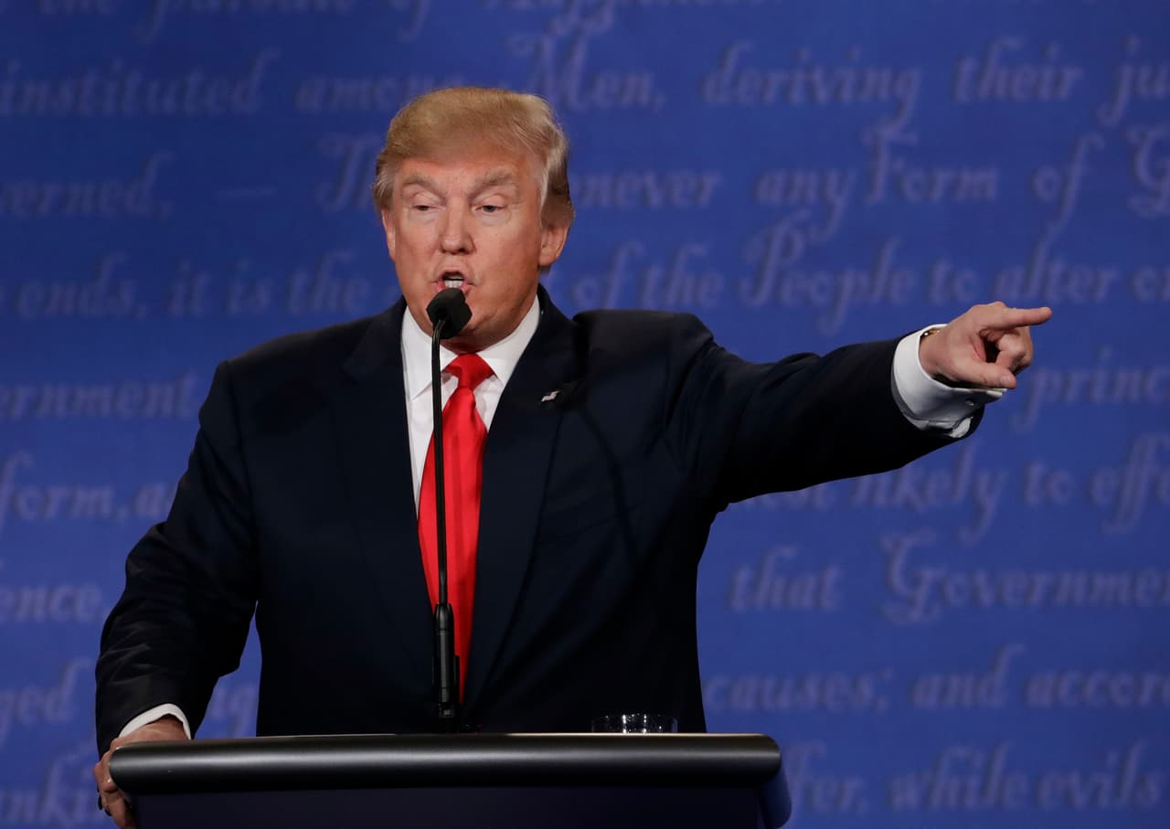 Republican presidential nominee Donald Trump speaks to Democratic presidential nominee Hillary Clinton during the third presidential debate at UNLV in Las Vegas, Wednesday, Oct. 19, 2016. (AP Photo/David Goldman)
