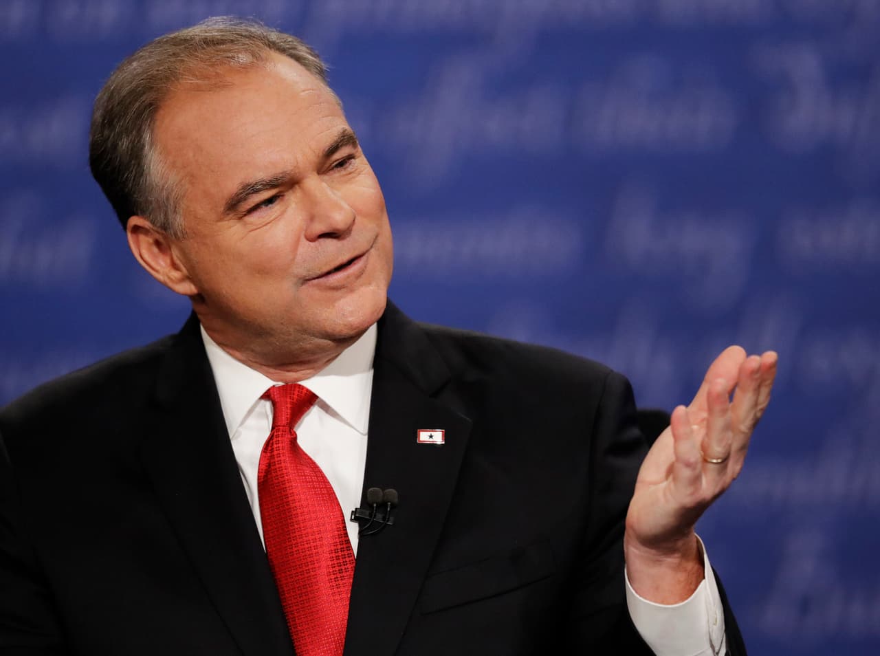 Democratic vice-presidential nominee Sen. Tim Kaine speaks to Republican vice-presidential nominee Gov. Mike Pence during the vice-presidential debate at Longwood University in Farmville, Va., Tuesday, Oct. 4, 2016. (AP Photo/Julio Cortez)