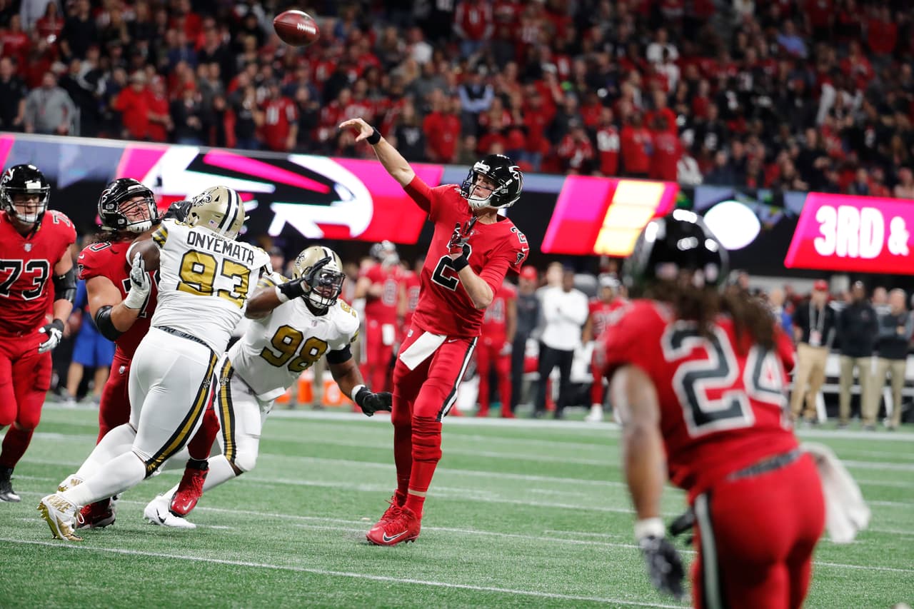 Atlanta Falcons quarterback Matt Ryan (2) works against the New Orleans Saints during the first half of an NFL football game, Thursday, Dec. 7, 2017, in Atlanta. (AP Photo/David Goldman)