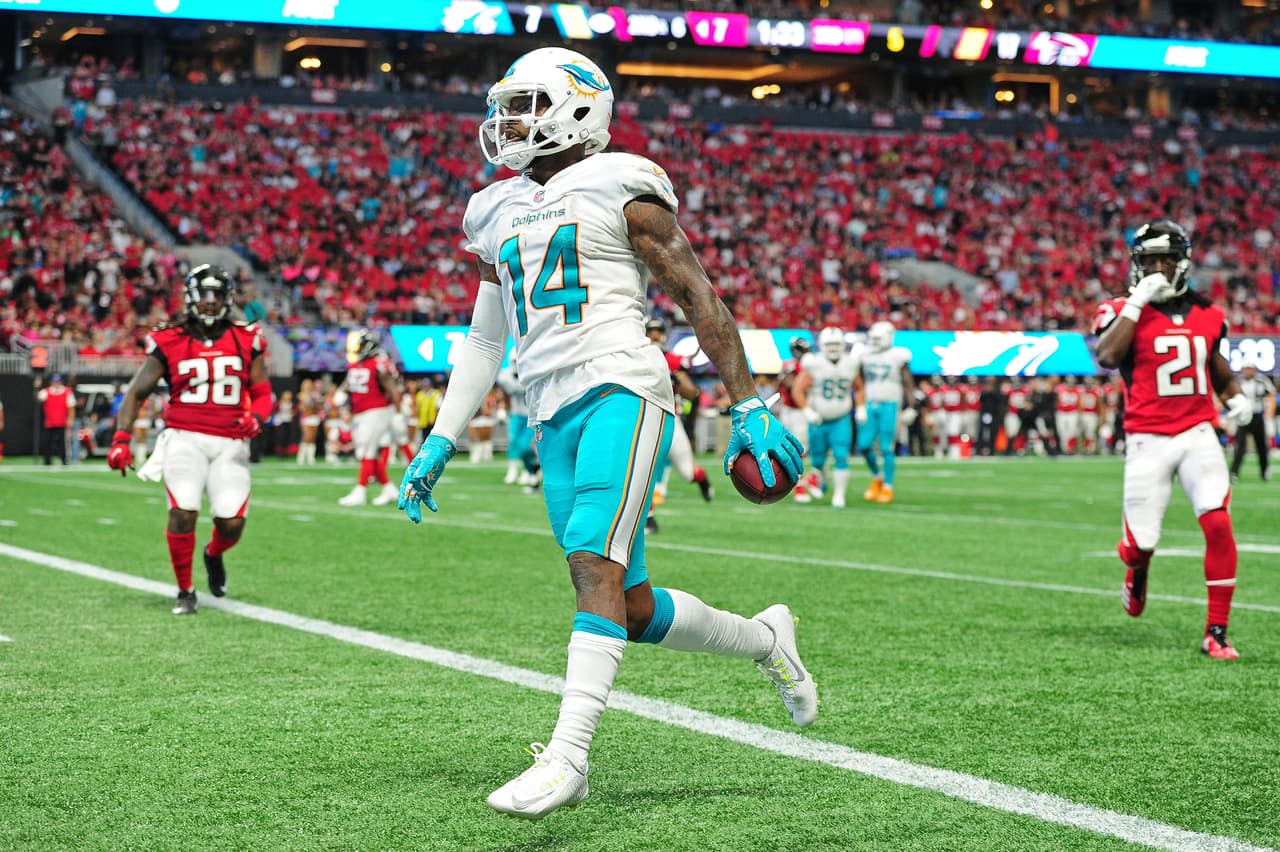 ATLANTA, GA - OCTOBER 15: Jarvis Landry #14 of the Miami Dolphins scores a second-half touchdown against the Atlanta Falcons at Mercedes-Benz Stadium on October 15, 2017 in Atlanta, Georgia. (Photo by Scott Cunningham/Getty Images)