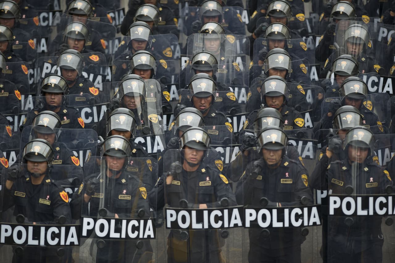 Peruvian policemen march during the traditional military parade commemorating the country's independence anniversary, in Lima on July 29, 2015. AFP PHOTO / ERNESTO BENAVIDES (Photo credit should read ERNESTO BENAVIDES/AFP/Getty Images)