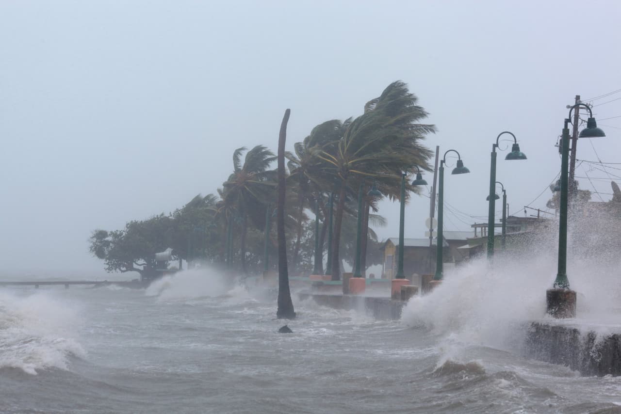 Waves crash against the seawall as Hurricane Irma slammed across islands in the northern Caribbean on Wednesday, in Fajardo, Puerto Rico September 6, 2017. REUTERS/Alvin Baez TPX IMAGES OF THE DAY