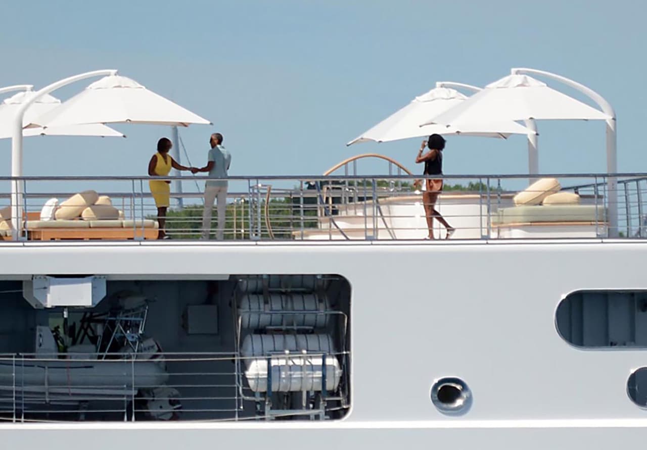 Photo © 2017 Zuma Press/The Grosby Group EXCLUSIVE Moorea, April 14, 2017. Former U.S. President Barack Obama takes a holiday photo of his wife, Michelle, as she poses on the top deck of the 138 meter Rising Sun yacht where the couple and celebrity friends spent the morning off the Island of Moorea, in the South Pacific, part of French Polynesia on April 14, 2017. The Obamas were vacationing with Bruce Springsteen, Tom Hanks and Oprah Winfrey and spent two hours aboard music mogul David Geffen's luxury yacht before leaving Tahiti.