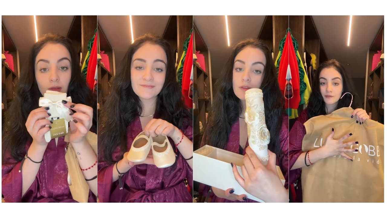 Paola Dalay muestra parte del ajuar de su hija para su bautizo.