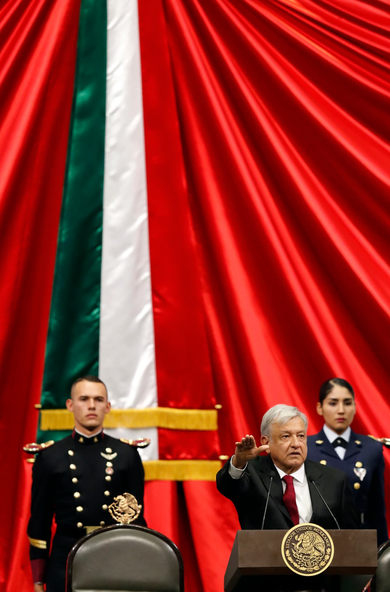 Mexico's new President Andres Manuel Lopez Obrador takes the oath of office during the inaugural ceremony at the National Congress in Mexico City, Saturday, Dec. 1, 2018. (AP Photo/Eduardo Verdugo)