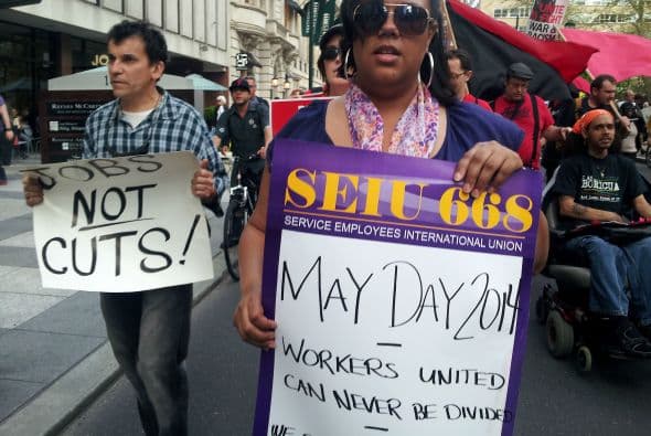 El origen del Día del Trabajo comenzó con los sindicatos. Esta mujer es miembra de unos de los sindicatos más grandes en la ciudad.