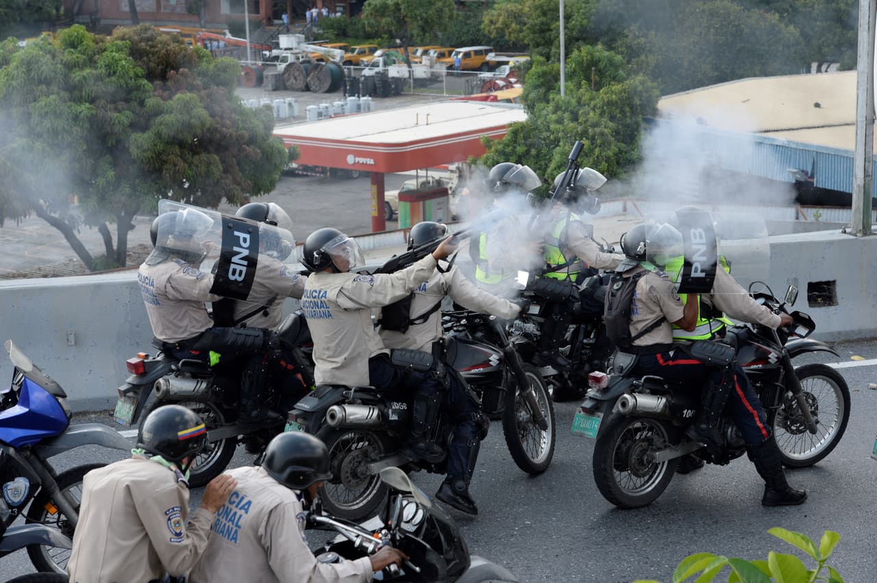 The Bolivarian National Police tried to quel protests April 24 with tear gas and rubber bullets.