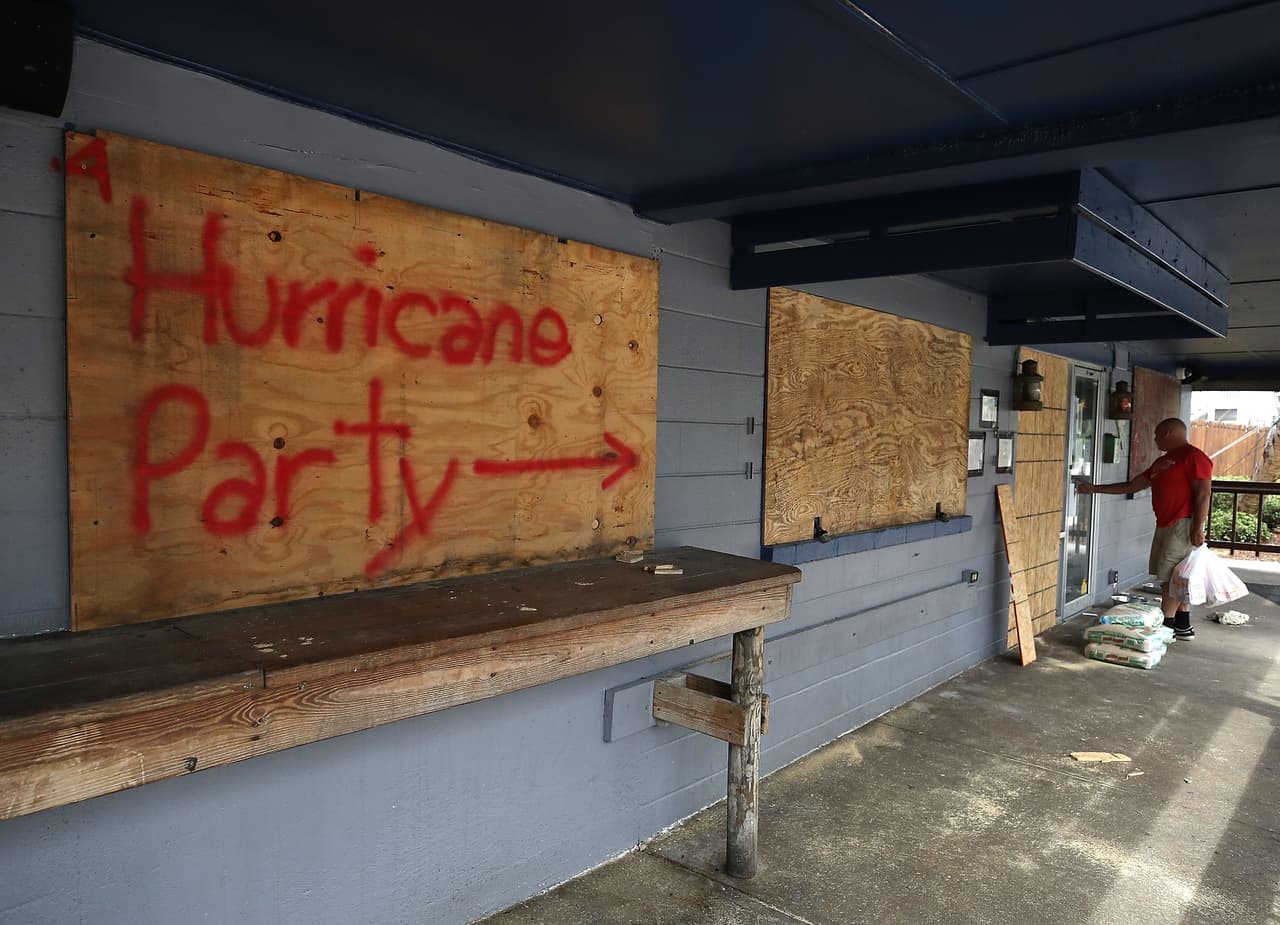 WRIGHTSVILLE BEACH, NC- SEPTEMBER 11: Hurricane Party is written on plywood covering the window of the Lager Heads Tavern as they prepare for the arrival of Hurricane Florence on September 11, 2018 in Wrightsville Beach, United States. Hurricane Florence is expected on Friday possibly as a category 4 storm along the Virginia, North Carolina and South Carolina coastline. (Photo by Mark Wilson/Getty Images)
