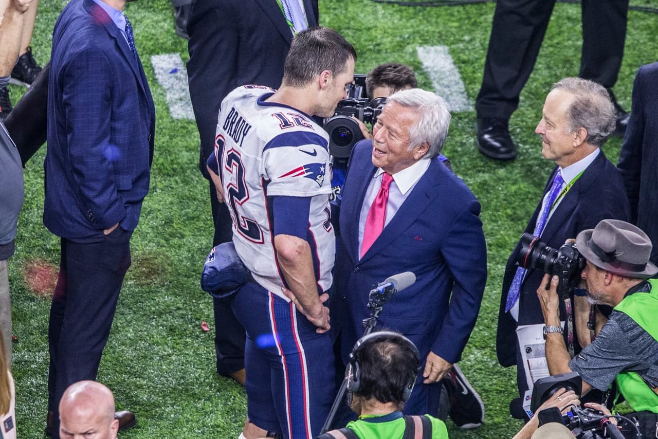 New England Patriots quarterback Tom Brady (#12) talks with Patriots owner Robert Kraft after winning Super Bowl LI between the New England Patriots and the Atlanta Falcons held at the NRG Stadium on February 5, 2017 in Houston, TX. (Photo by Dave Clements) *** Please Use Credit from Credit Field ***(Sipa via AP Images)