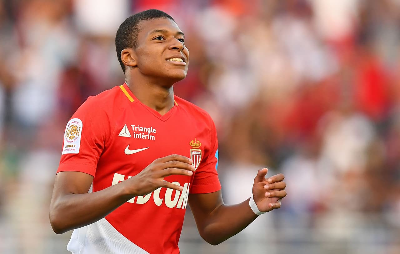 Monaco's French forward Kylian Mbappe reacts after missing a goal opportunity during the French Trophy of Champions (Trophee des Champions) football match between Monaco (ASM) and Paris Saint-Germain (PSG) on July 29, 2017, at the Grand Stade in Tangiers. / AFP PHOTO / FRANCK FIFE (Photo credit should read FRANCK FIFE/AFP/Getty Images)