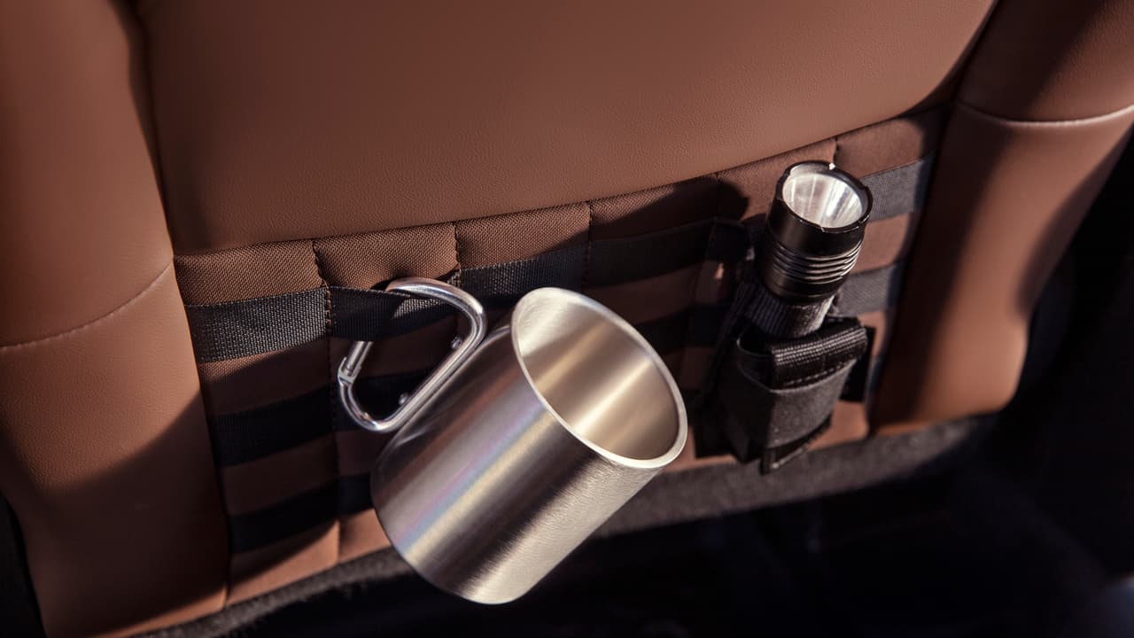 Human-centered design led to special Bronco Sport features, such as seatback MOLLE strap system to help users safely and easily transport gear. (Pre-production model pictured.)