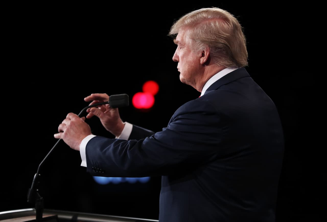 LAS VEGAS, NV - OCTOBER 19: Republican presidential nominee Donald Trump adjusts the microphone during the third U.S. presidential debate at the Thomas & Mack Center on October 19, 2016 in Las Vegas, Nevada. Tonight is the final debate ahead of Election Day on November 8. (Photo by Joe Raedle/Getty Images)