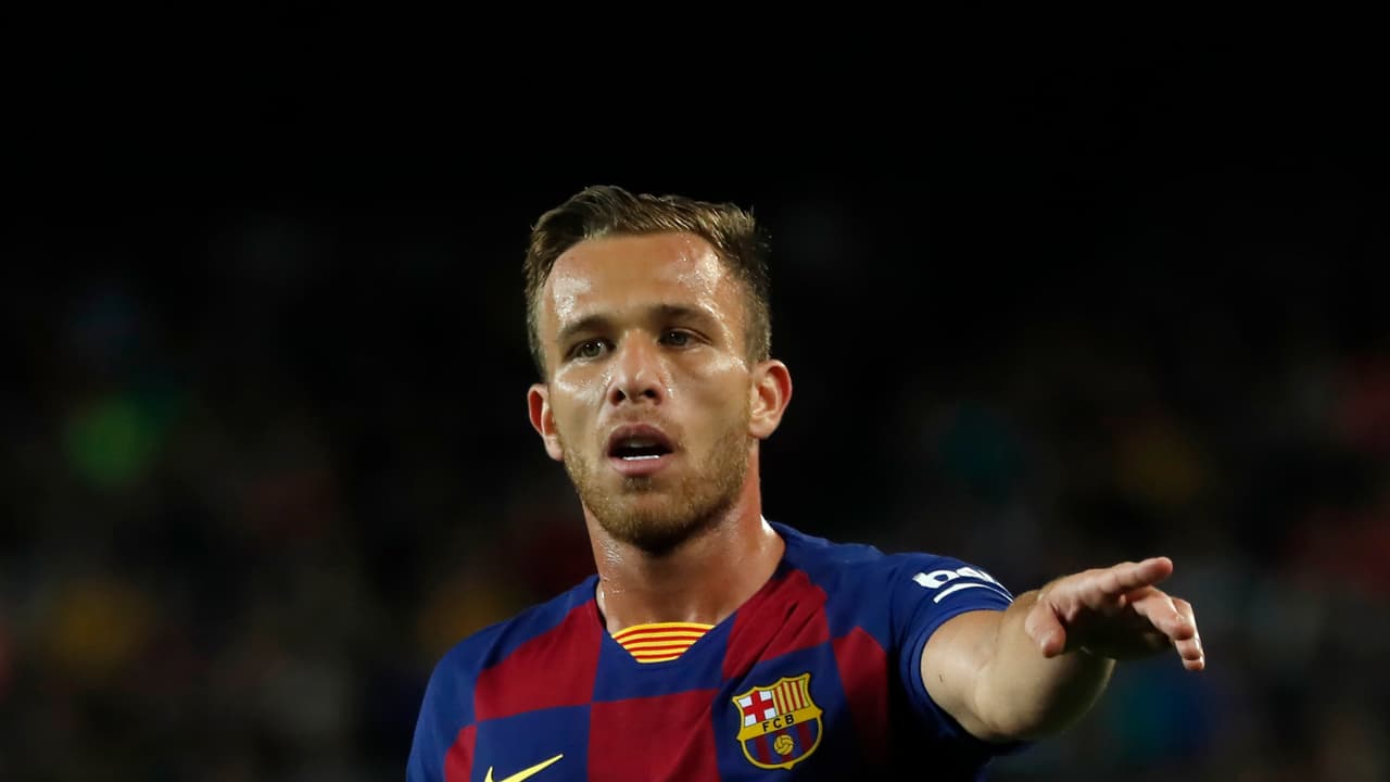 Barcelona's Arthur Melo gestures during Spanish La Liga soccer match between Barcelona and Sevilla at the Camp Nou stadium in Barcelona, Sunday, Oct. 6, 2019. (AP Photo/Joan Monfort)